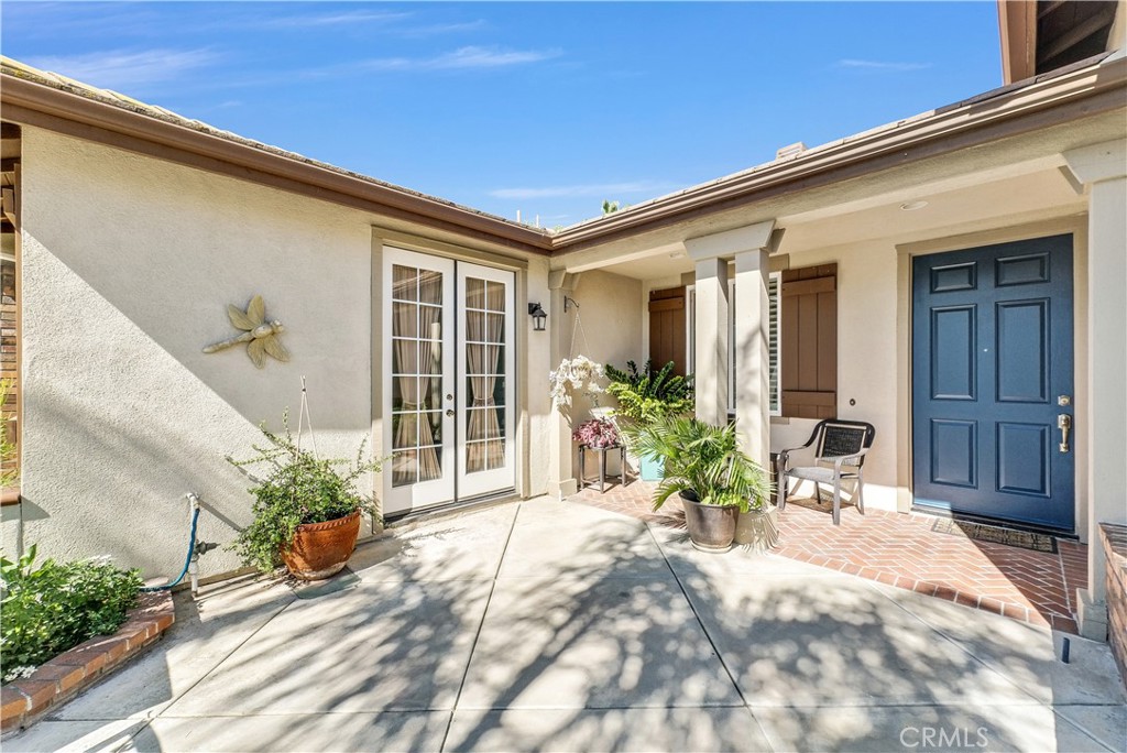 45407 Callesito Altar Temecula, CA 92592 - Photo 3 of 47 a view of a chair and table in the patio