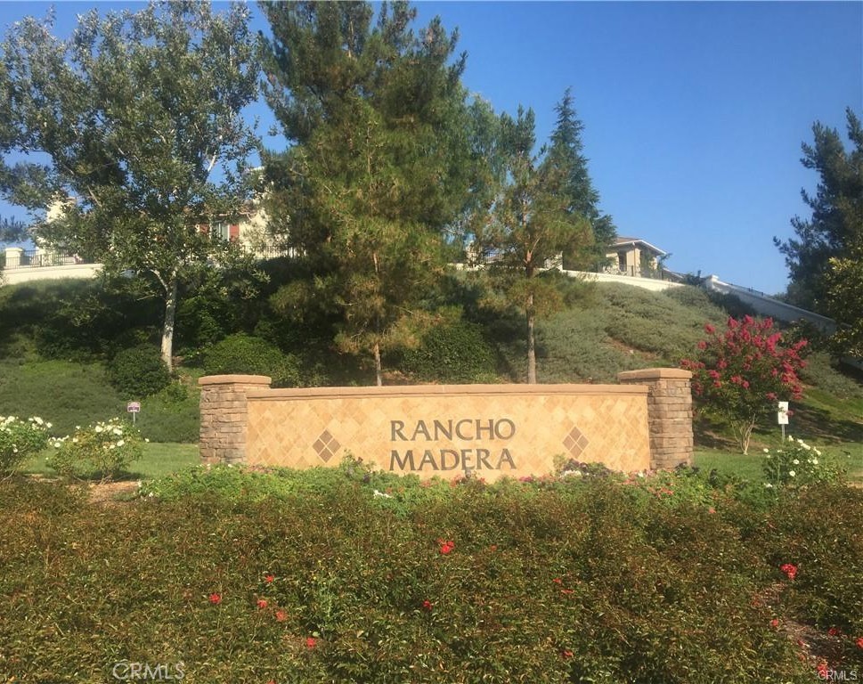 45407 Callesito Altar Temecula, CA 92592 - Photo 45 of 47 a view of a back yard of a house with a lake view