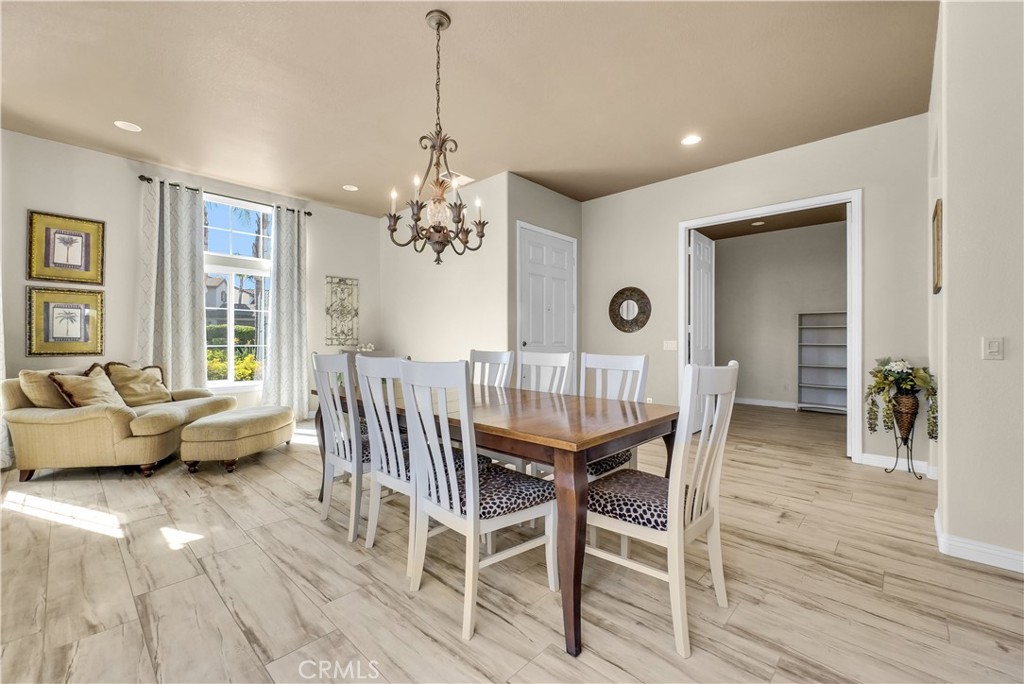 45407 Callesito Altar Temecula, CA 92592 - Photo 10 of 47 a view of a dining room with furniture window and wooden floor