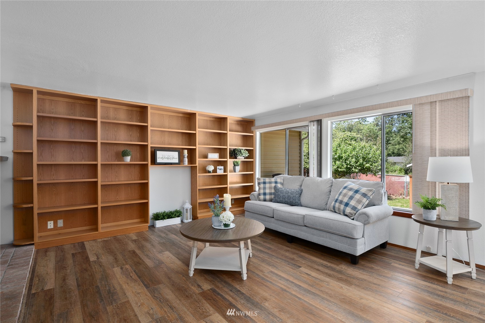 813 226th Street Southeast Bothell, WA 98021 - Photo 12 of 30 a living room with furniture and a large window