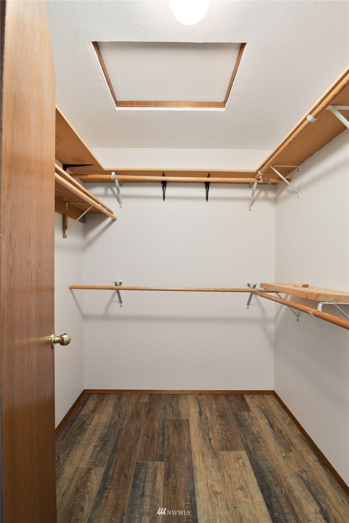 813 226th Street Southeast Bothell, WA 98021 - Photo 17 of 30 a view of an empty walk in closet