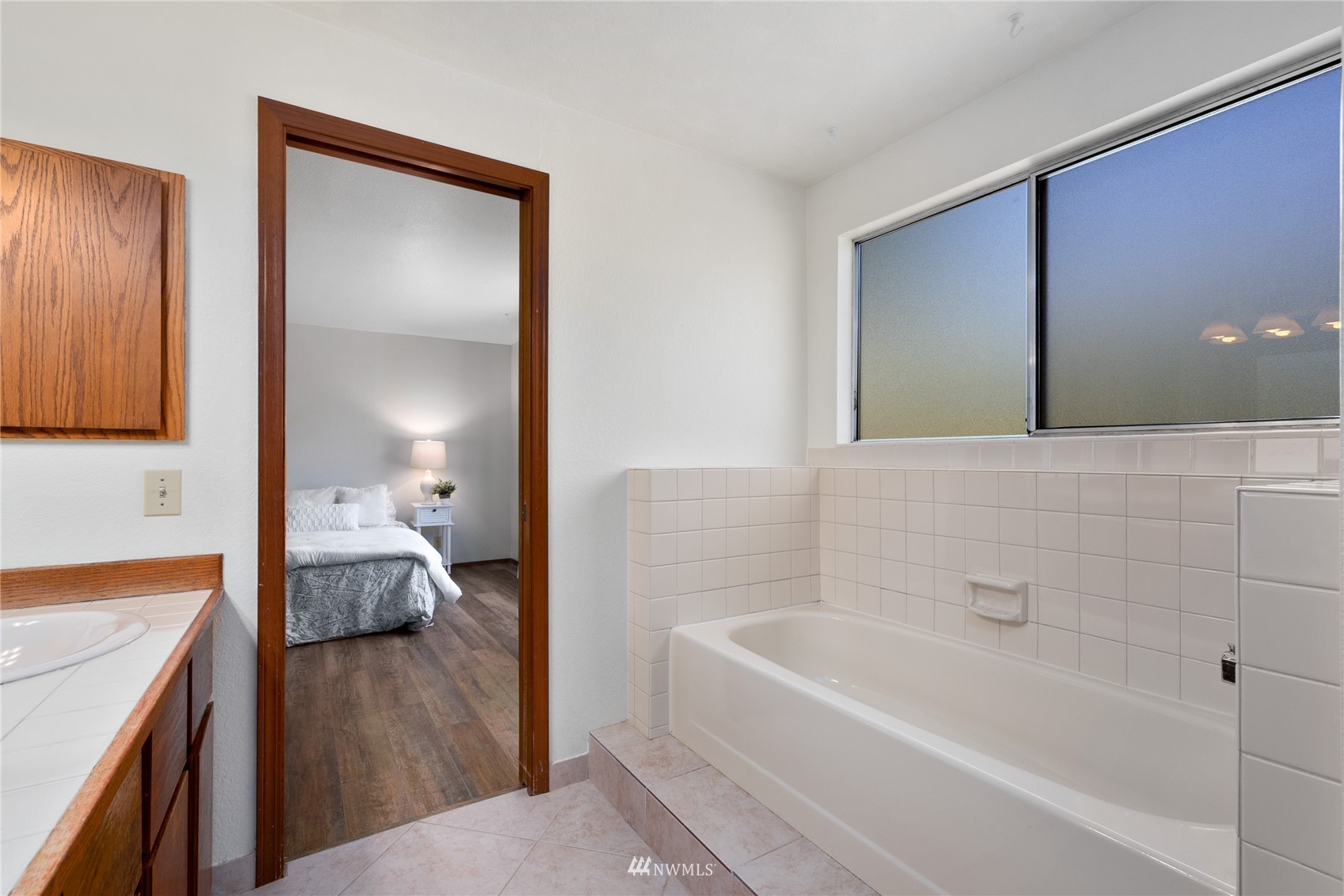 813 226th Street Southeast Bothell, WA 98021 - Photo 18 of 30 a bathroom with a tub and shower