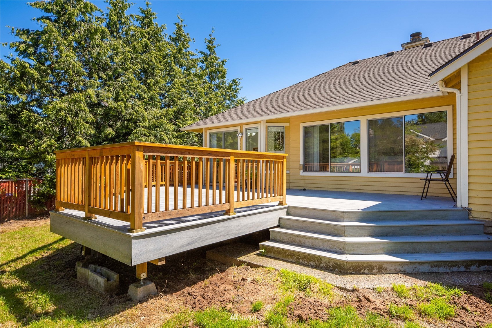 813 226th Street Southeast Bothell, WA 98021 - Photo 28 of 30 a view of backyard with deck and a garden