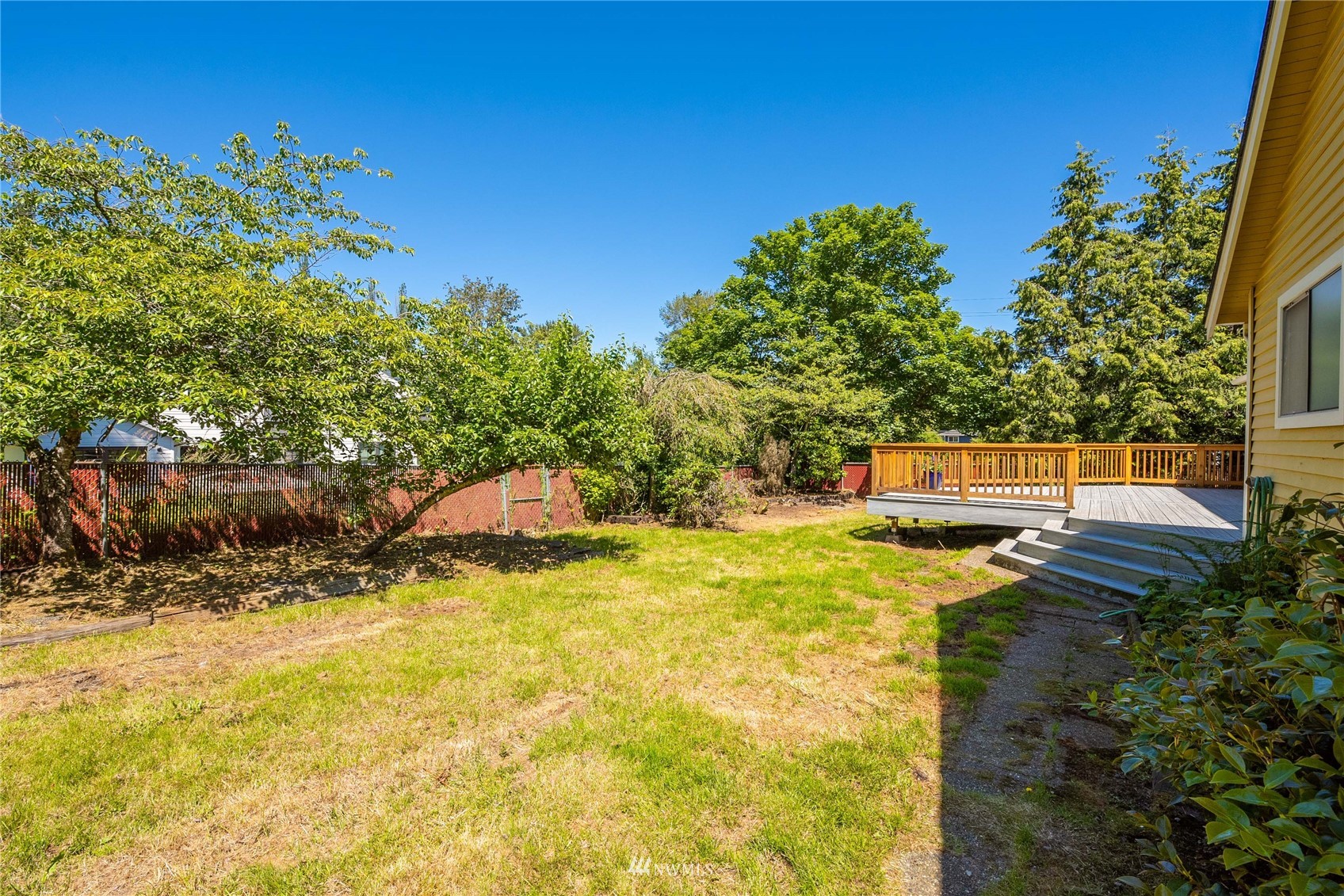 813 226th Street Southeast Bothell, WA 98021 - Photo 30 of 30 a view of a swimming pool with an outdoor seating and a yard