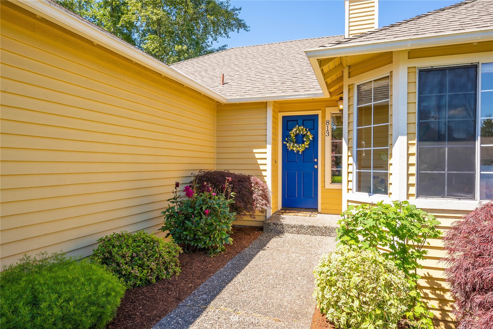 813 226th Street Southeast Bothell, WA 98021 - Photo 4 of 30 a view of a entryway door front of house