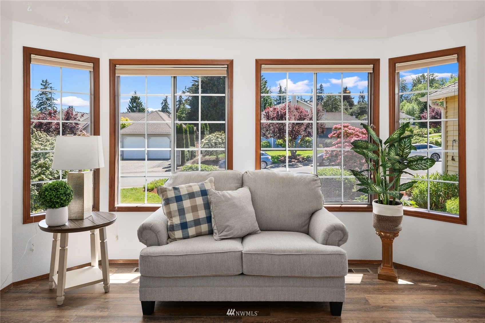 813 226th Street Southeast Bothell, WA 98021 - Photo 6 of 30 a living room with furniture and a potted plant