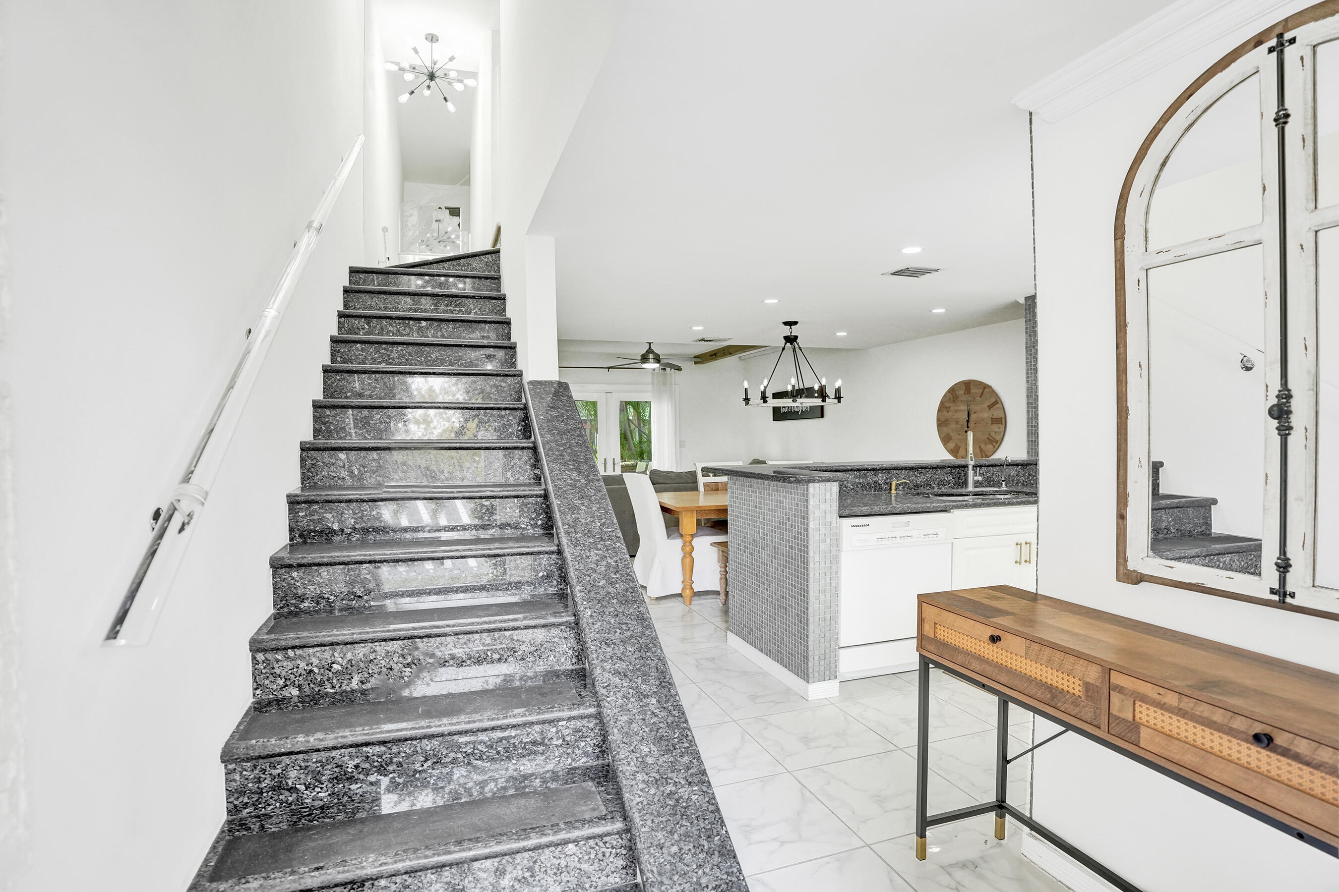 147 Southwest 3rd Street Pompano Beach, FL 33060 - Photo 16 of 29 a view of entryway and hall with wooden floor