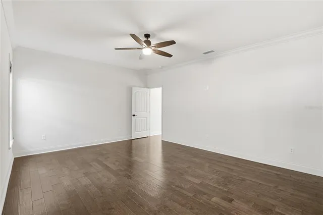a bathroom with a double vanity sink and mirror