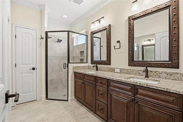 a view of a small space with wooden floor and a window