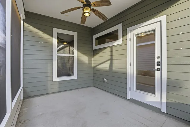 a view of backyard with seating space