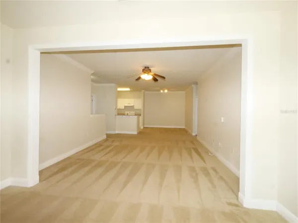a view of a room with a wooden floor
