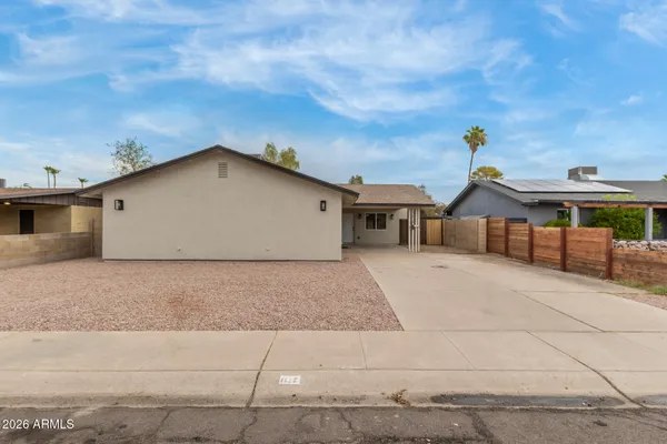 a house view with a backyard space