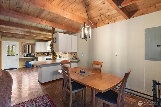 a view of a dining room with furniture