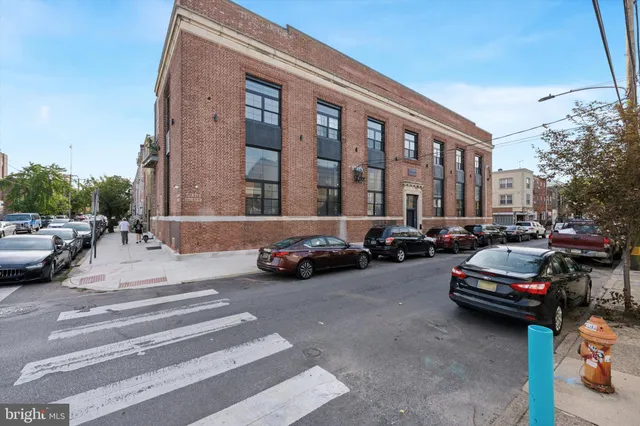 a car parked in front of a building