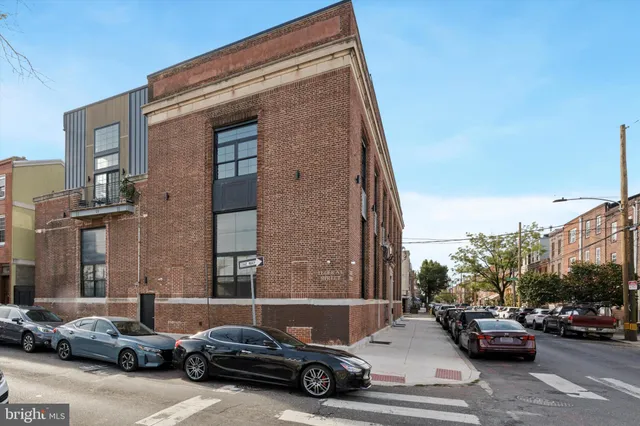 a car parked in front of a building