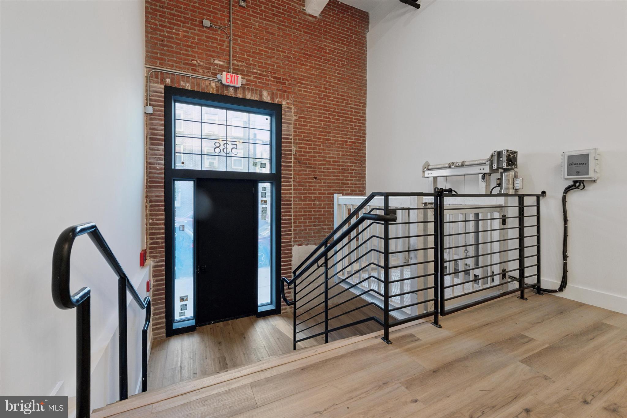 538 Federal Street, Unit 104 Philadelphia, PA 19147 - Photo 26 of 27 a view of a balcony with wooden floor