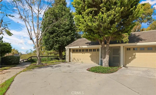 a house with trees in front of it