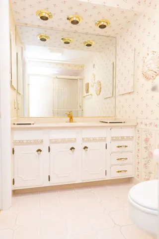 a bathroom with a shower and toilet