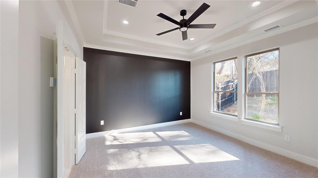 801 Birch Street Grand Prairie, TX 75050 - Photo 13 of 28 an empty room with windows and closet