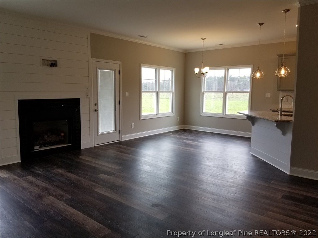 5224-lot7 J T Matthews Road Godwin, NC 28344 - Photo 18 of 42 an empty room with wooden floor and windows