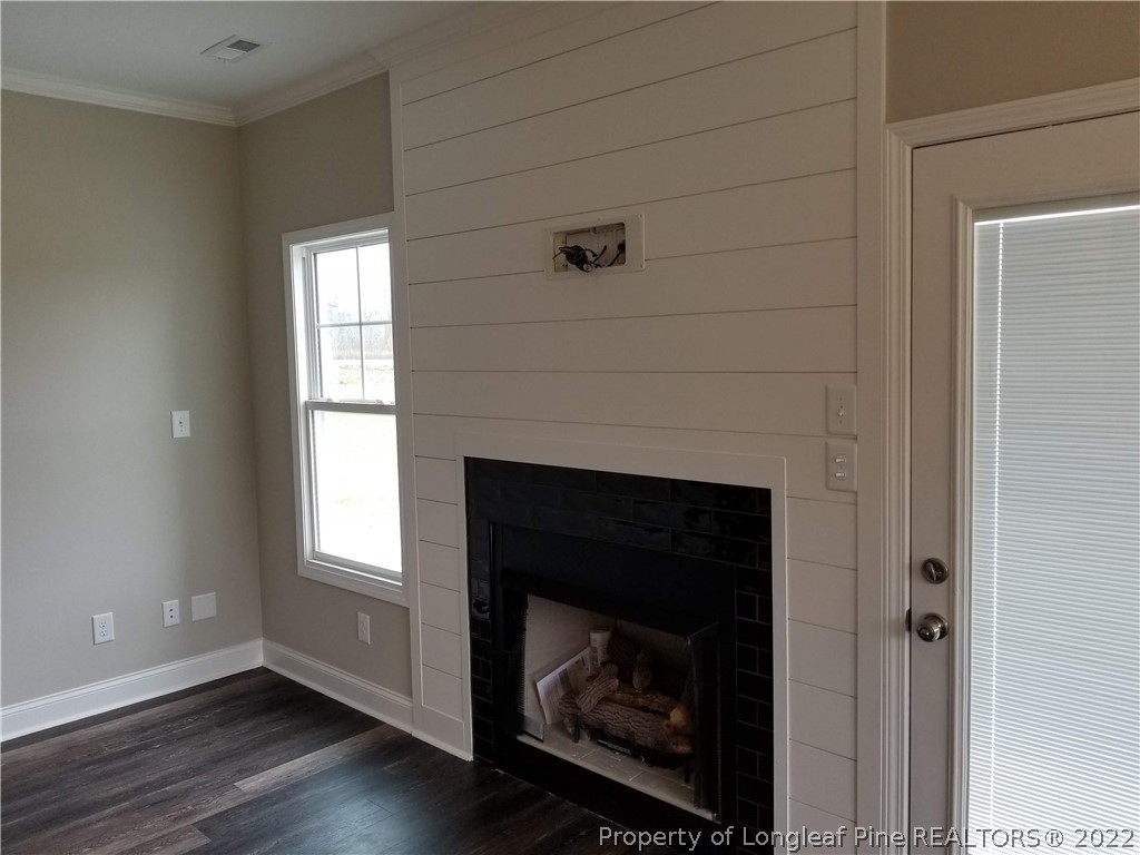 5224-lot7 J T Matthews Road Godwin, NC 28344 - Photo 19 of 42 a living room with a fireplace