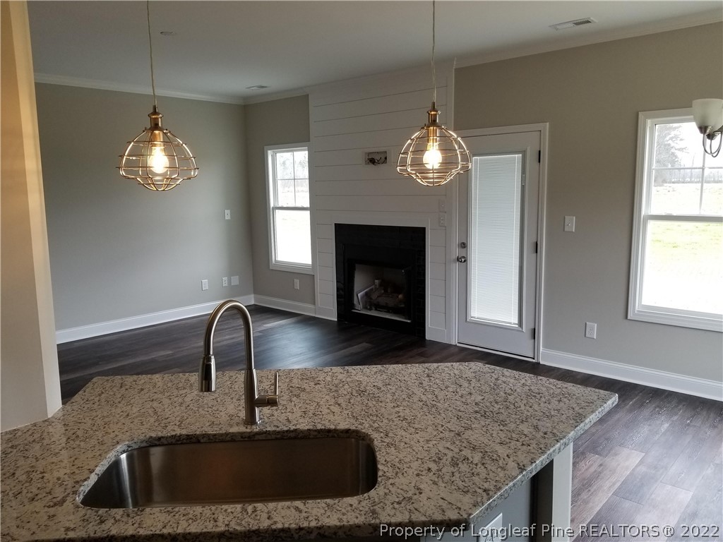 5224-lot7 J T Matthews Road Godwin, NC 28344 - Photo 27 of 42 a kitchen with a sink granite counter tops and a window