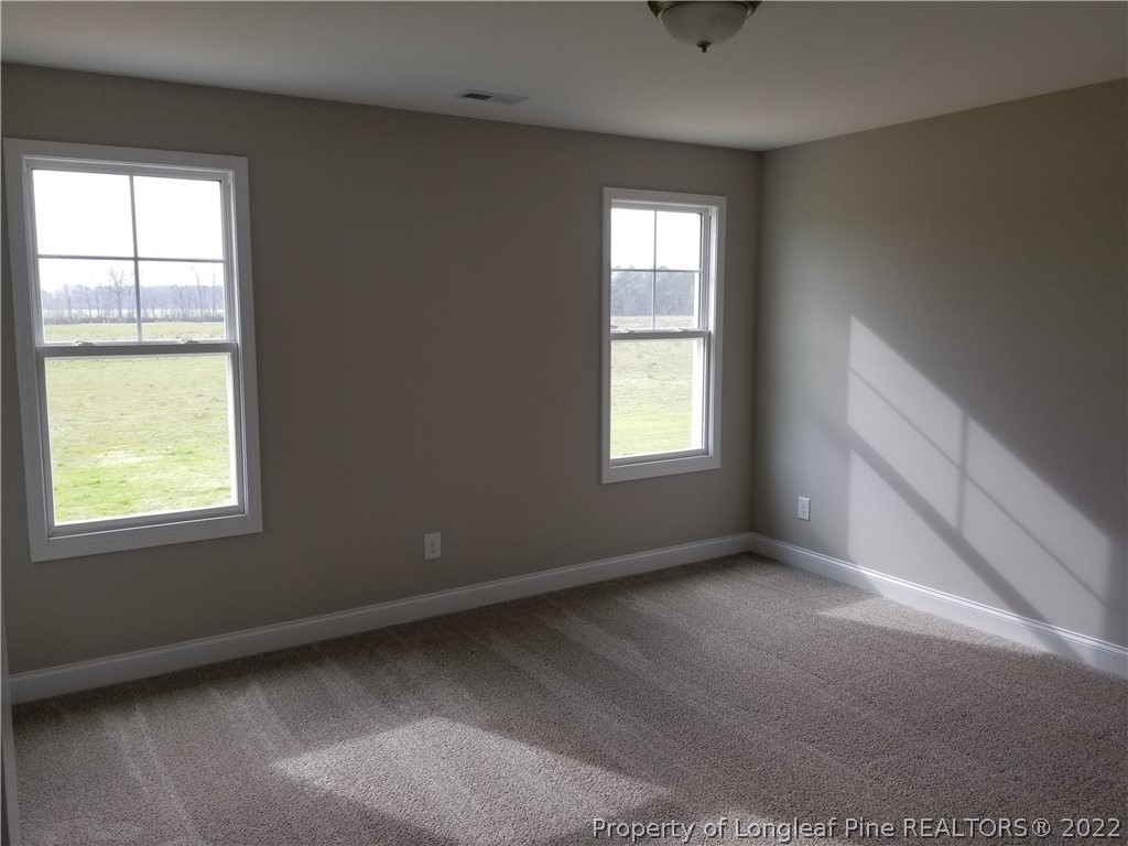 5224-lot7 J T Matthews Road Godwin, NC 28344 - Photo 31 of 42 an empty room with windows