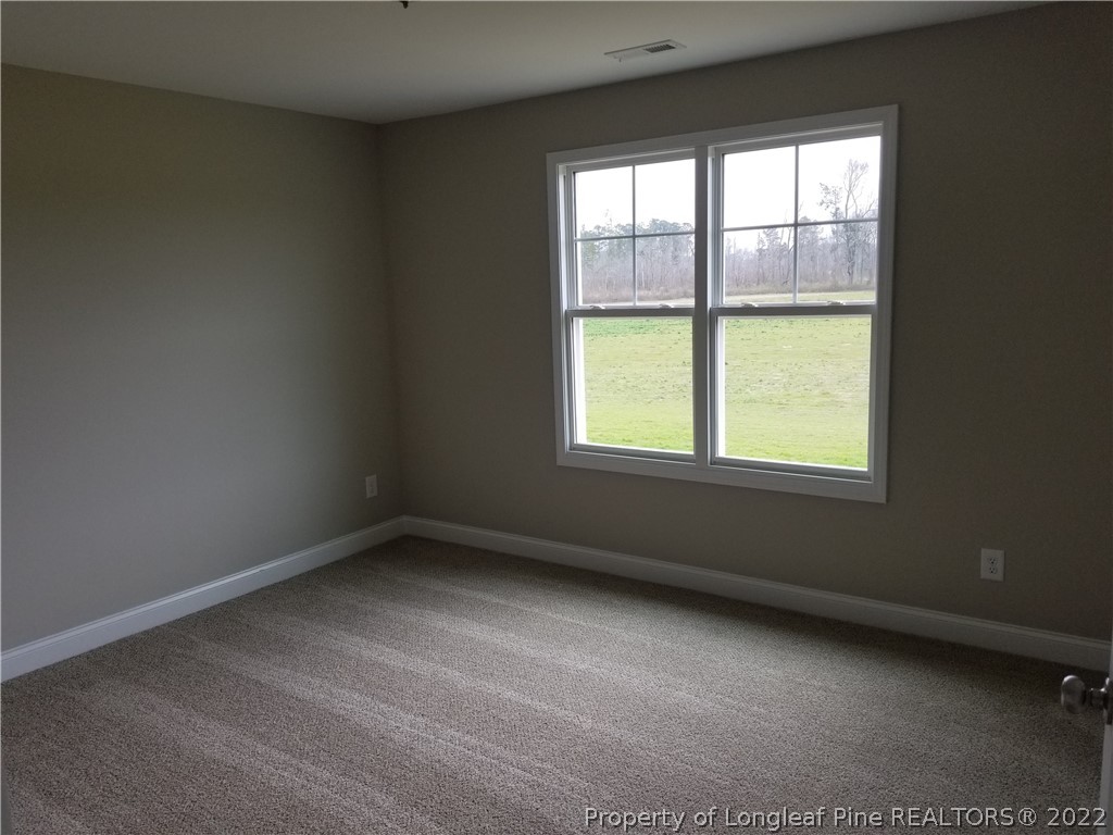 5224-lot7 J T Matthews Road Godwin, NC 28344 - Photo 32 of 42 an empty room with a window