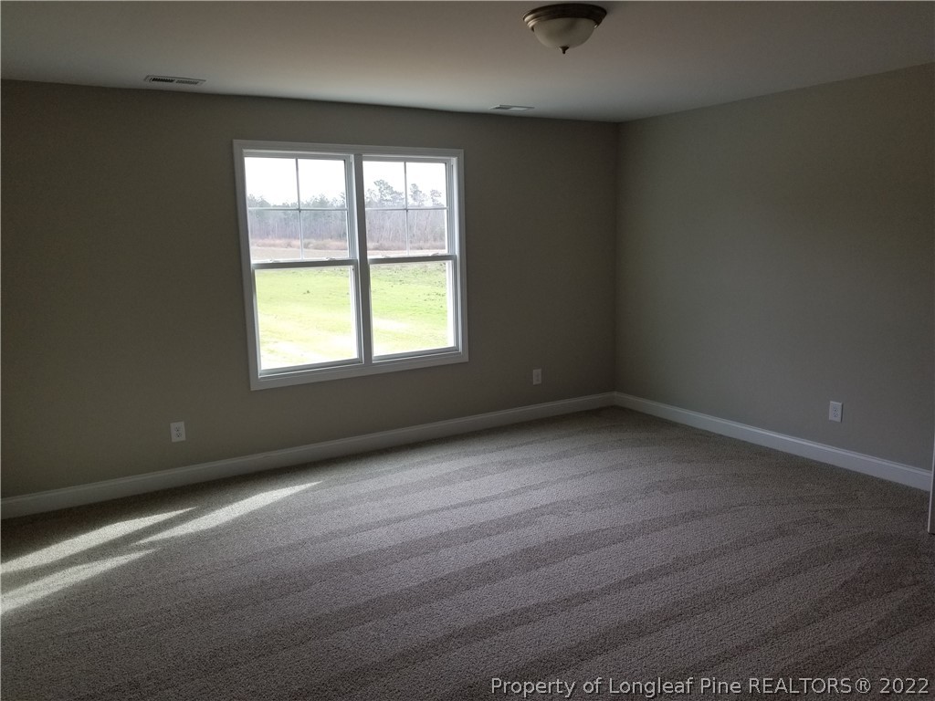 5224-lot7 J T Matthews Road Godwin, NC 28344 - Photo 33 of 42 an empty room with a window