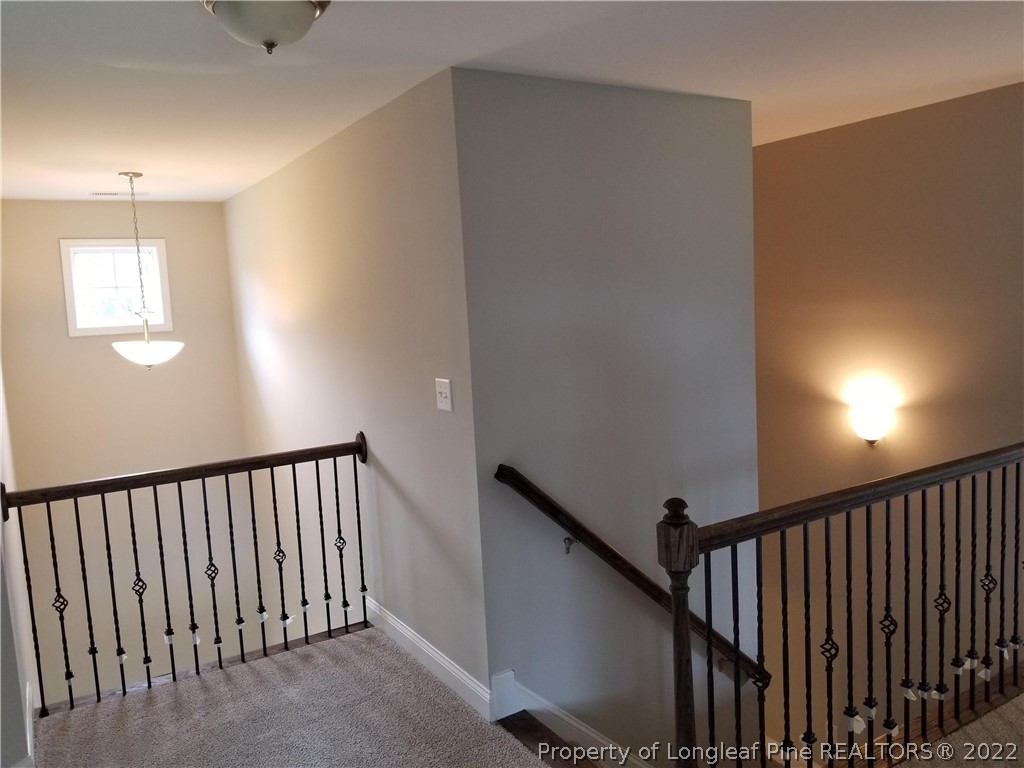 5224-lot7 J T Matthews Road Godwin, NC 28344 - Photo 39 of 42 a view of staircase with rug floor