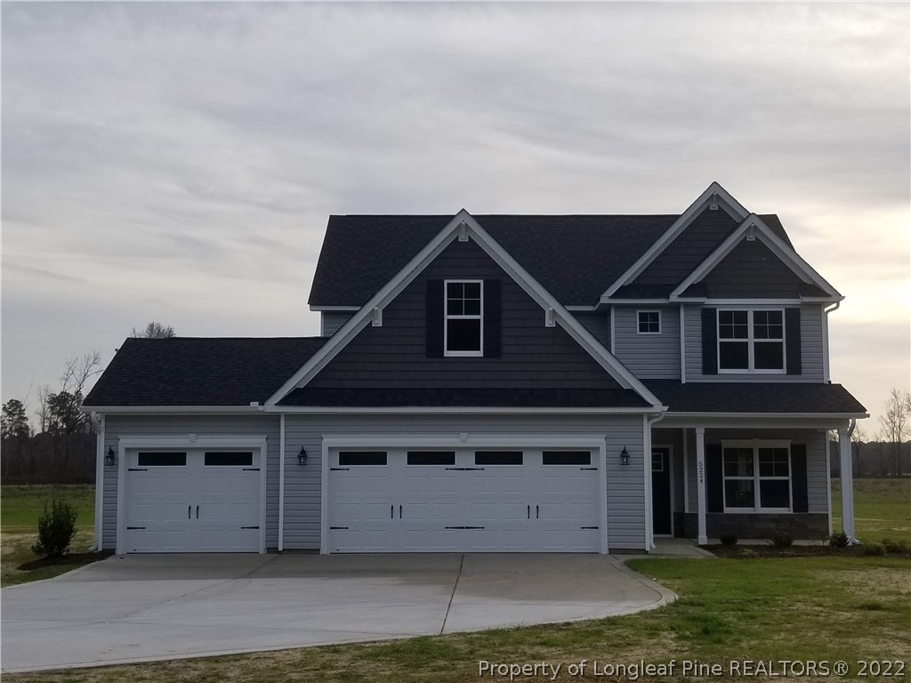 5224-lot7 J T Matthews Road Godwin, NC 28344 - Photo 7 of 42 a view of a house with a yard