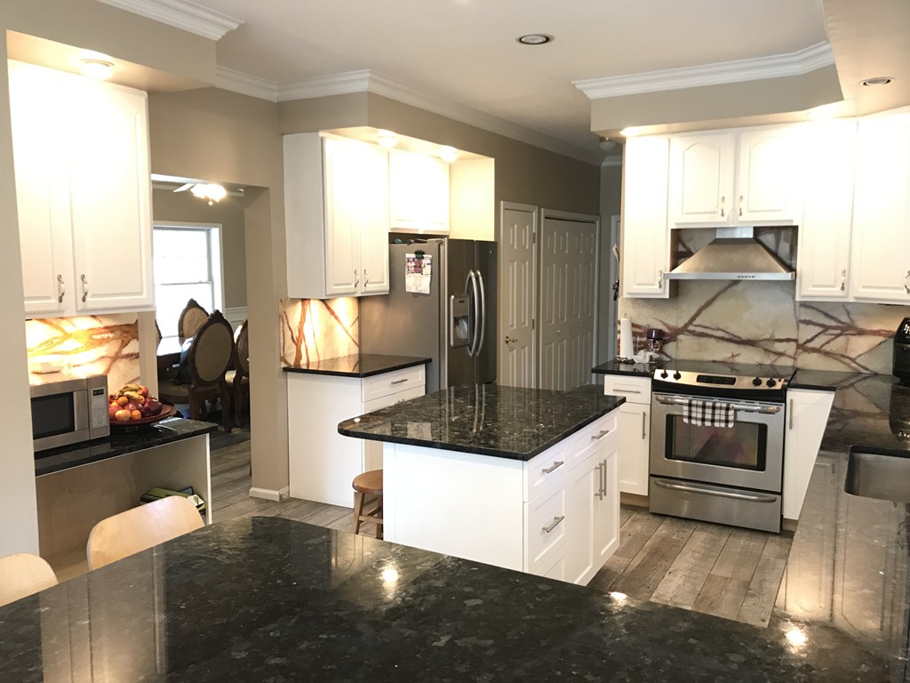 24 Fitzgerald Road Charlton, MA 01507 - Photo 23 of 42 a kitchen with stainless steel appliances granite countertop a stove and a refrigerator