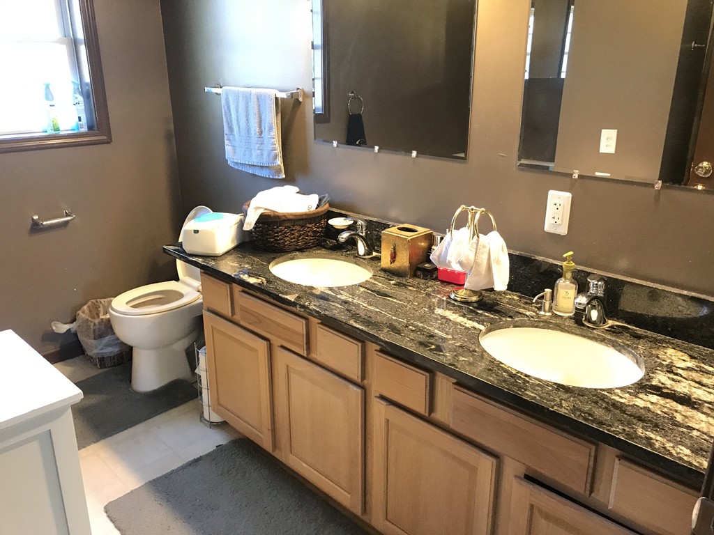 24 Fitzgerald Road Charlton, MA 01507 - Photo 39 of 42 a bathroom with a granite countertop double vanity sink toilet and a mirror