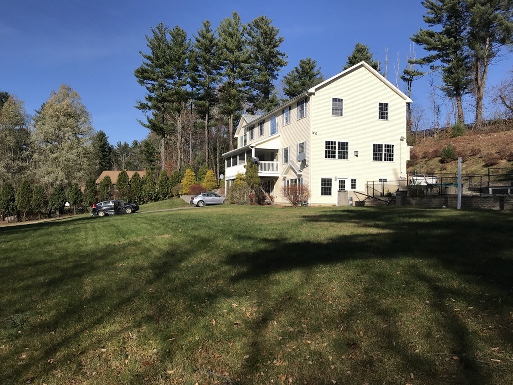24 Fitzgerald Road Charlton, MA 01507 - Photo 10 of 42 a view of house with garden