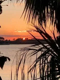 a view of outdoor space with mountain and yard