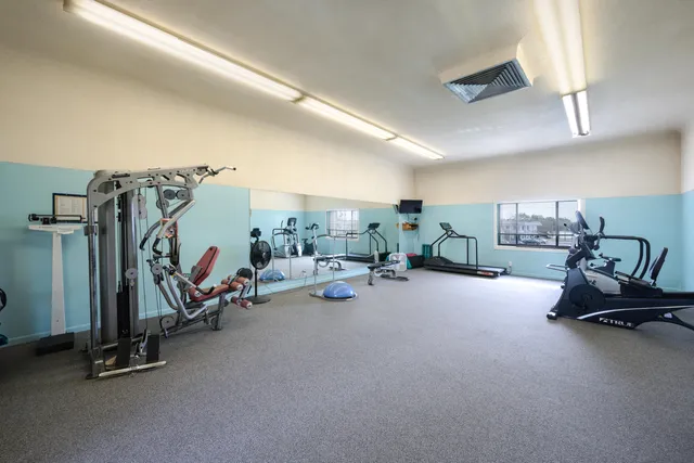 a view of a room with gym equipment