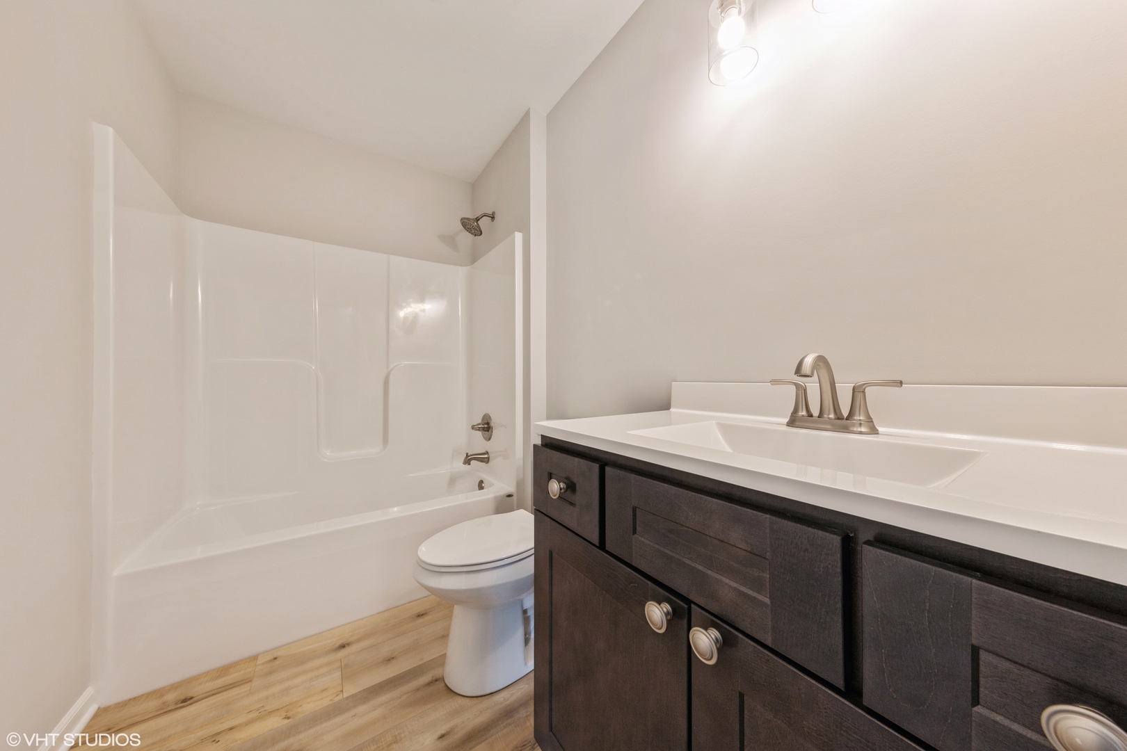 200 Crystal Lane Steger, IL 60475 - Photo 17 of 24 a bathroom with a sink a toilet and shower
