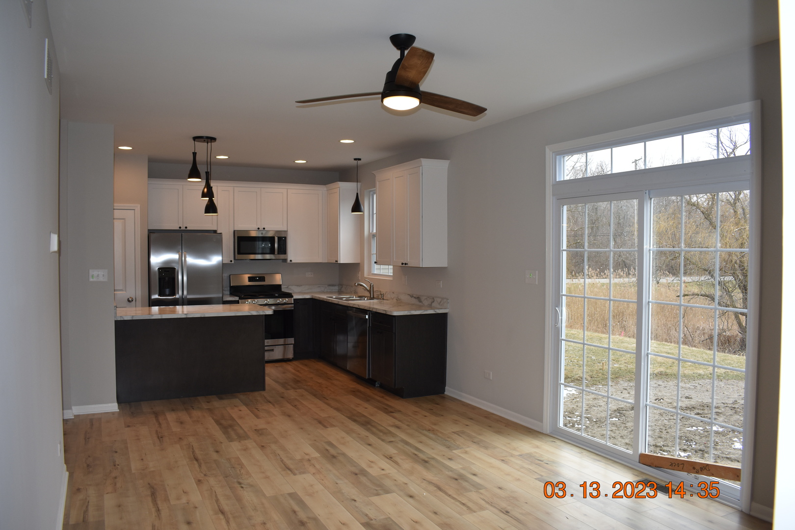 200 Crystal Lane Steger, IL 60475 - Photo 9 of 24 a kitchen with a refrigerator and a stove top oven