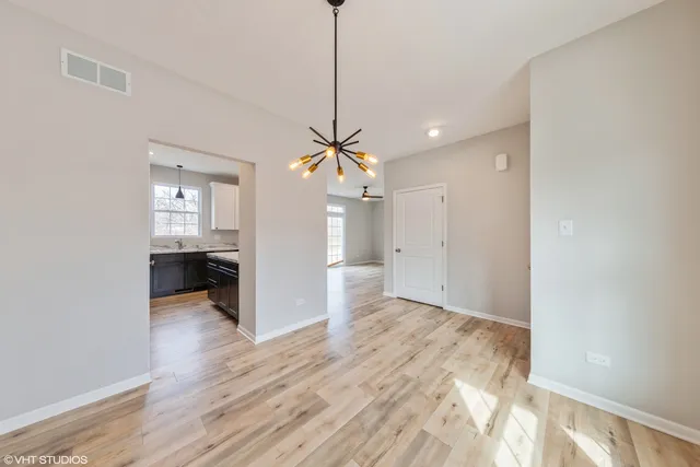 a view of a kitchen and a sink