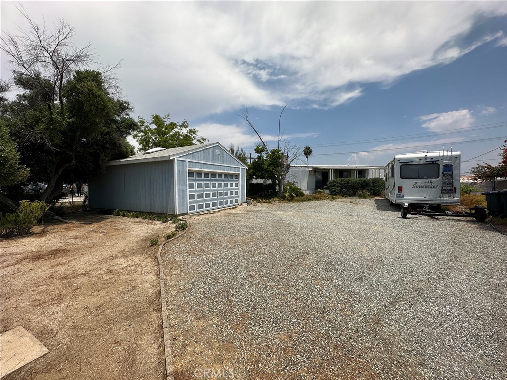 545 Apache Road Perris, CA 92570 - Photo 1 of 1 a car parked in front of house