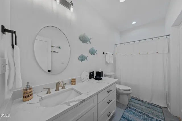 a view of a balcony with wooden floor