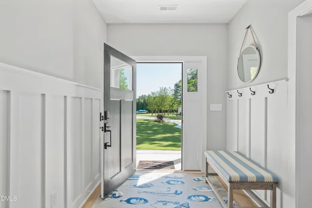 a living room with furniture or couch and a large window