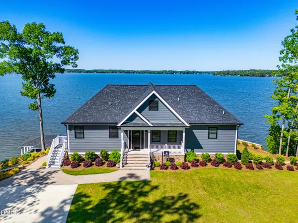 a living room with furniture or couch and a large window