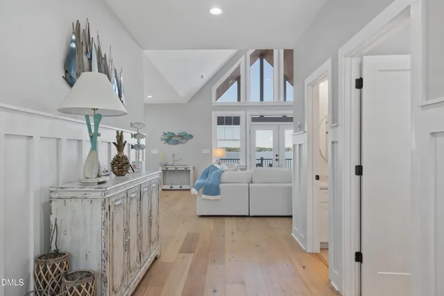 a kitchen with stainless steel appliances a sink stove and cabinets