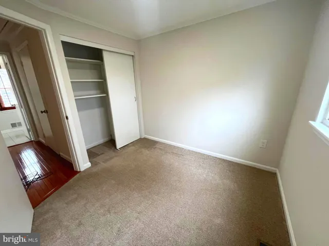 an empty room with closet