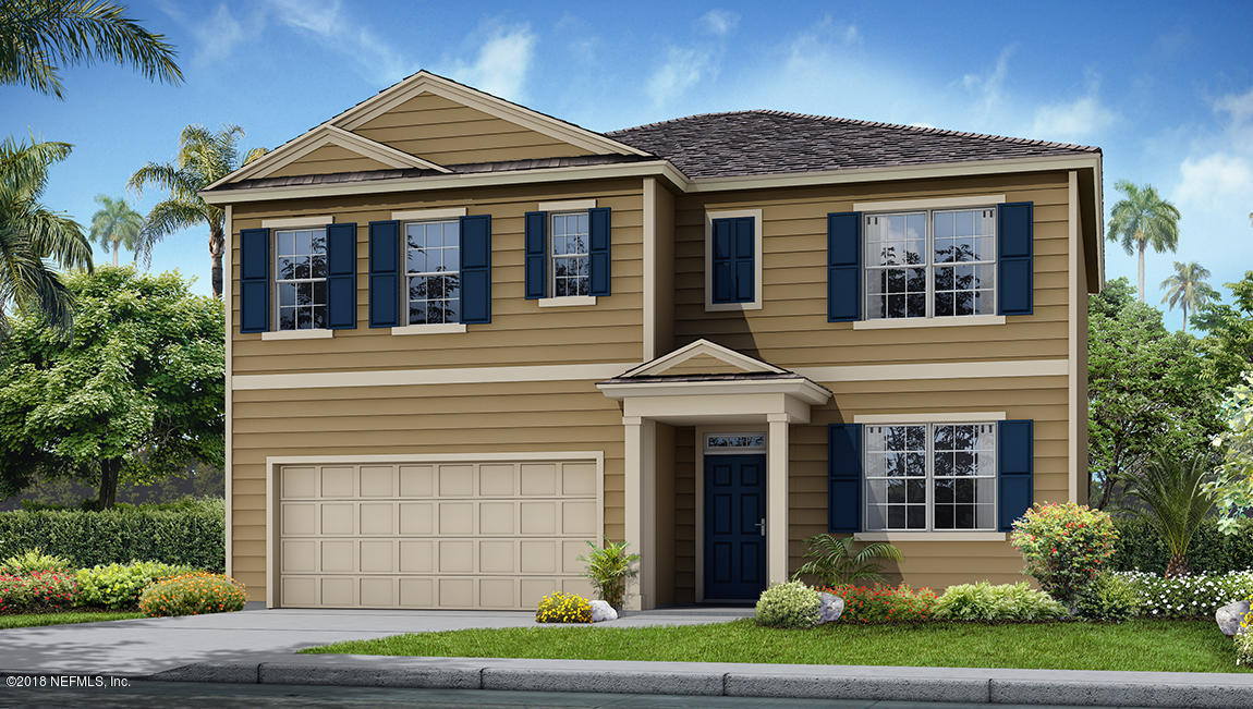 4232 Packer Meadow Way Middleburg, FL 32068 - Photo 1 of 5 a front view of a house with a yard and garage