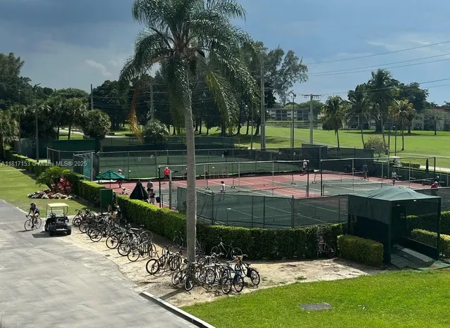 an outdoor view of a garden with lake view