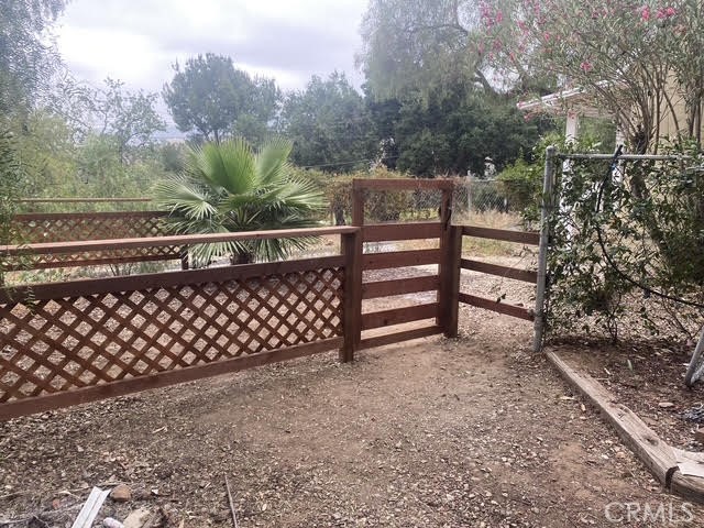 6818 Santa Susana Pass Road Simi Valley, CA 93063 - Photo 12 of 12 a view of a wooden fence