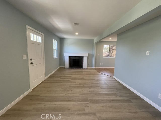 6818 Santa Susana Pass Road Simi Valley, CA 93063 - Photo 2 of 12 a view of an empty room with window and fire place