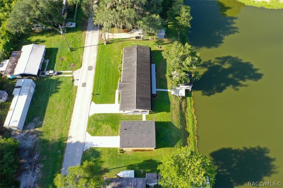 928 South Shad Terrace Inverness, FL 34450 - Photo 38 of 48 an aerial view of a house with a garden